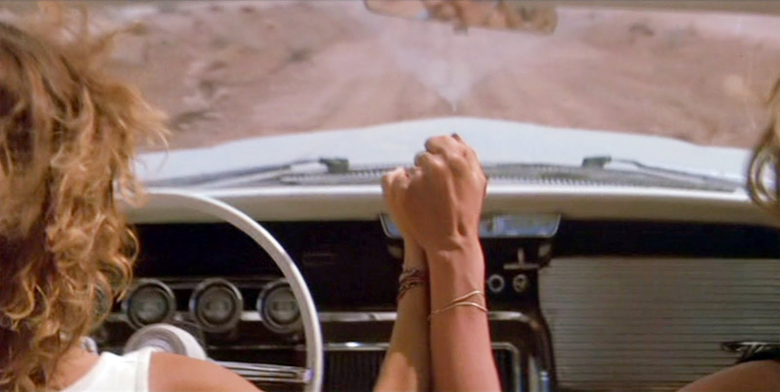 Thelma and Louise holding hands
